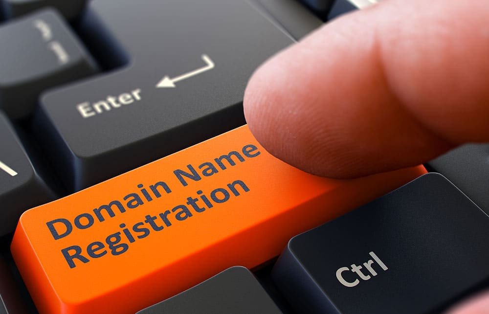 Finger Presses Orange Keyboard Button Domain Name Registration