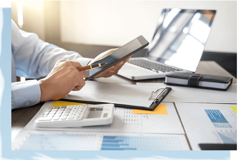 Businessman using tablet and doing finances