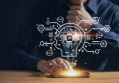 A man's hand holding a human AI business management