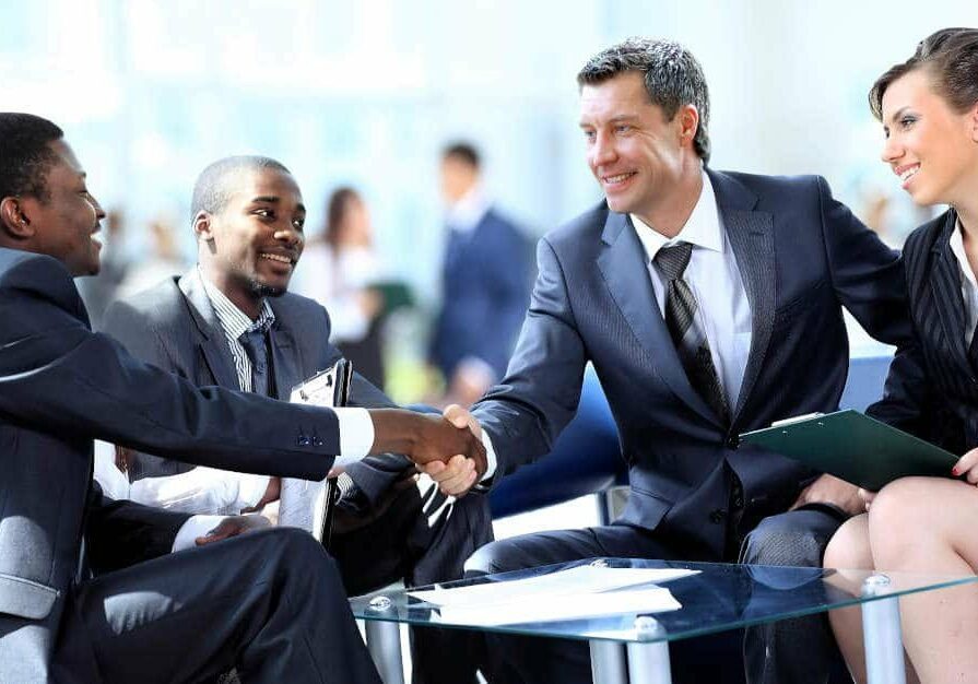 Business meeting with men shaking hands