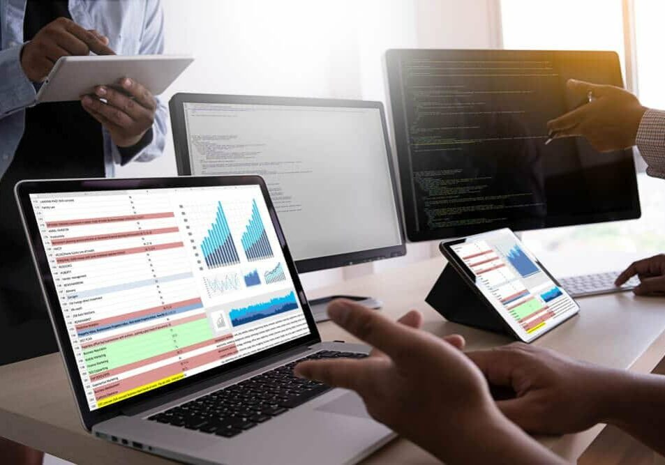 Business team looking at analytics report