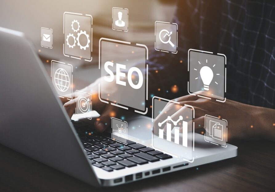 Businessman using a computer for analysis SEO Search Engine Optimization Marketing Ranking