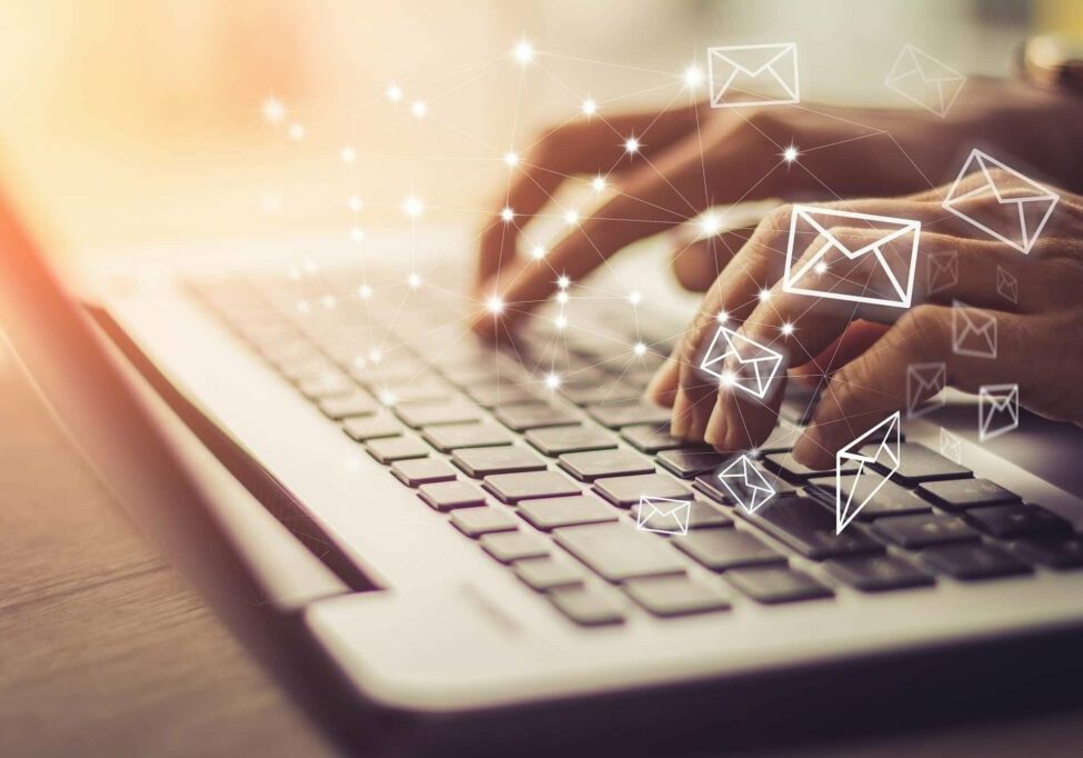 bounced-email Man typing on laptop keyboard