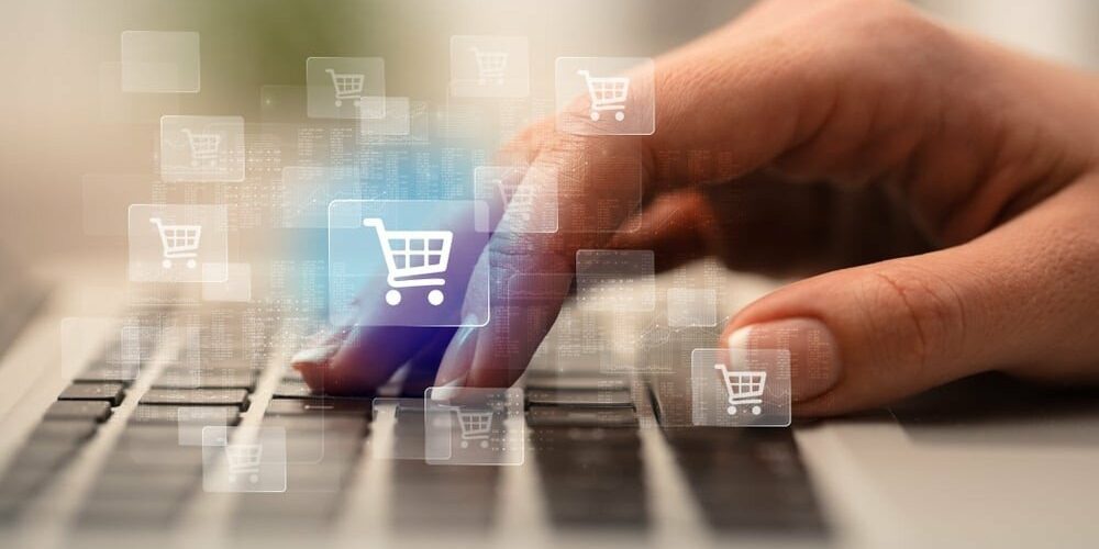 Business woman hand typing on keyboard with online shopping concept