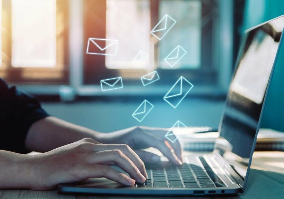 email-campaign and of businesswoman checking message box on digital laptop working at home